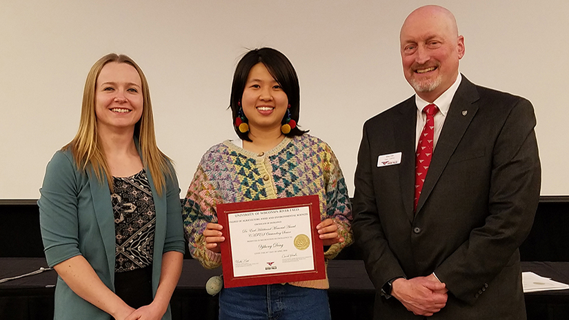 Assistant Professor of Dairy Processing Grace Lewis, Yihong Deng, CAFES Dean Michael Orth.