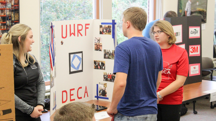 DECA members with UWRF CBE student